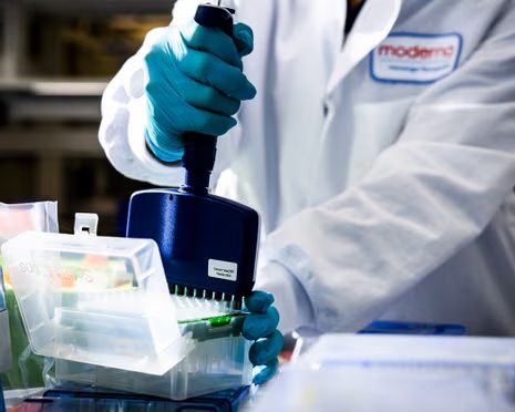 An assistant conducts cancer vaccine research at Moderna's headquarters in Cambridge, Massachusetts, in 2024.