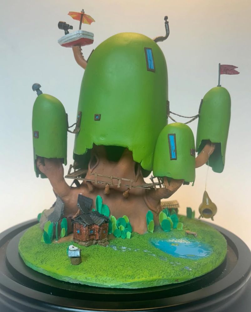 Miniature diorama of the Adventure Time tree house.
