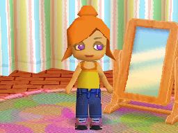 Screenshot taken directly from MySims DS. A Sim is standing in the customization room. The Sim has the updo hairstyle in orange, purple eyes, a yellow and orange camisole, indigo jeans, and purple shoes.