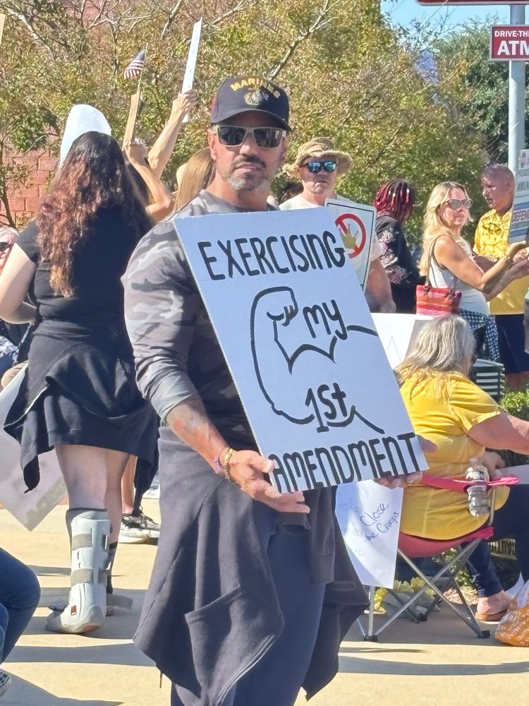 Exercising my 1st Amendment. (He’s very buff. I missed getting a picture of him flexing.)