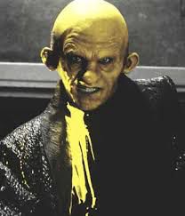 That yellow bastard in Sin City with a neck wound