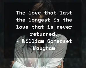 Image of a person in a white shirt hugging themself with 