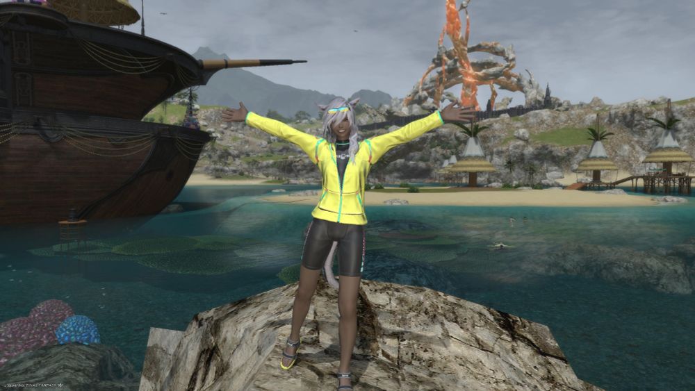 A screenshot of a moonkeeper miqo'te wearing a yellow and black swim outfit in Costa del Sol. She's /welcoming the viewer with a big smile on her face.