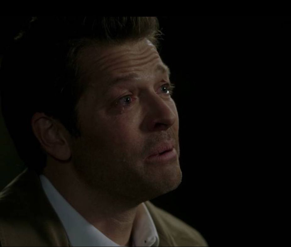 Castiel against dark background crying 