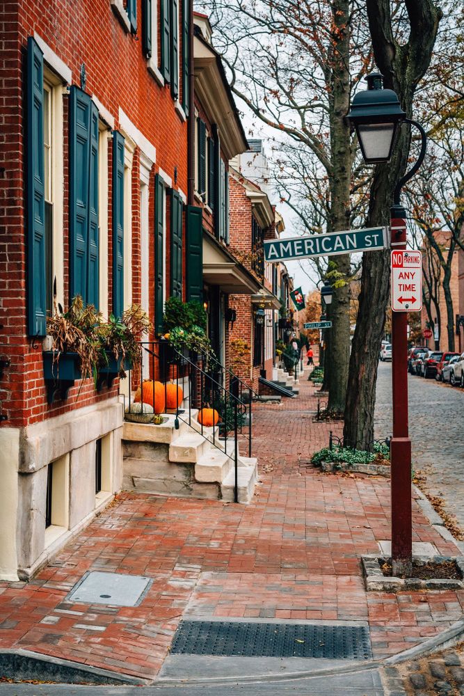 Row houses on Delancey Street and American Street sign in Society Hill, Philadelphia, Pennsylvania