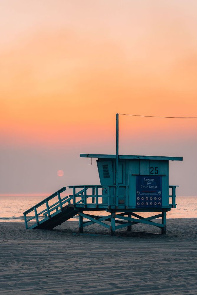 Lifeguard stand on the beach at sunset, in Santa Monica, Los Angeles, California