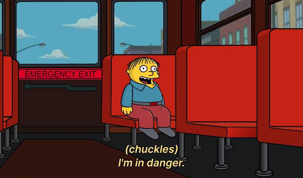 The simpsons meme of that kid sitting on a bus saying "(chuckles) I'm in Danger."