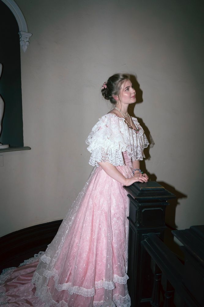 A similar photo to the second, now with the purple bracelet visible which is very relevant to the plot of the game so those who were there will Know