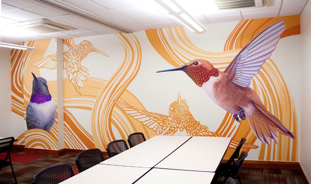 A full view of the mural and the conference room tables. 