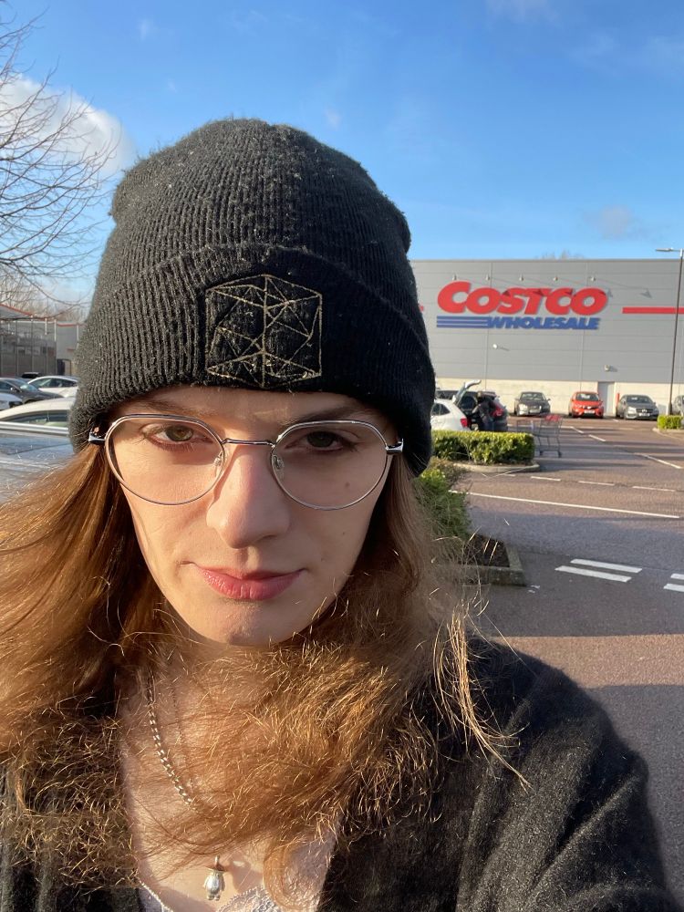 eden selfie standing in front of costco store