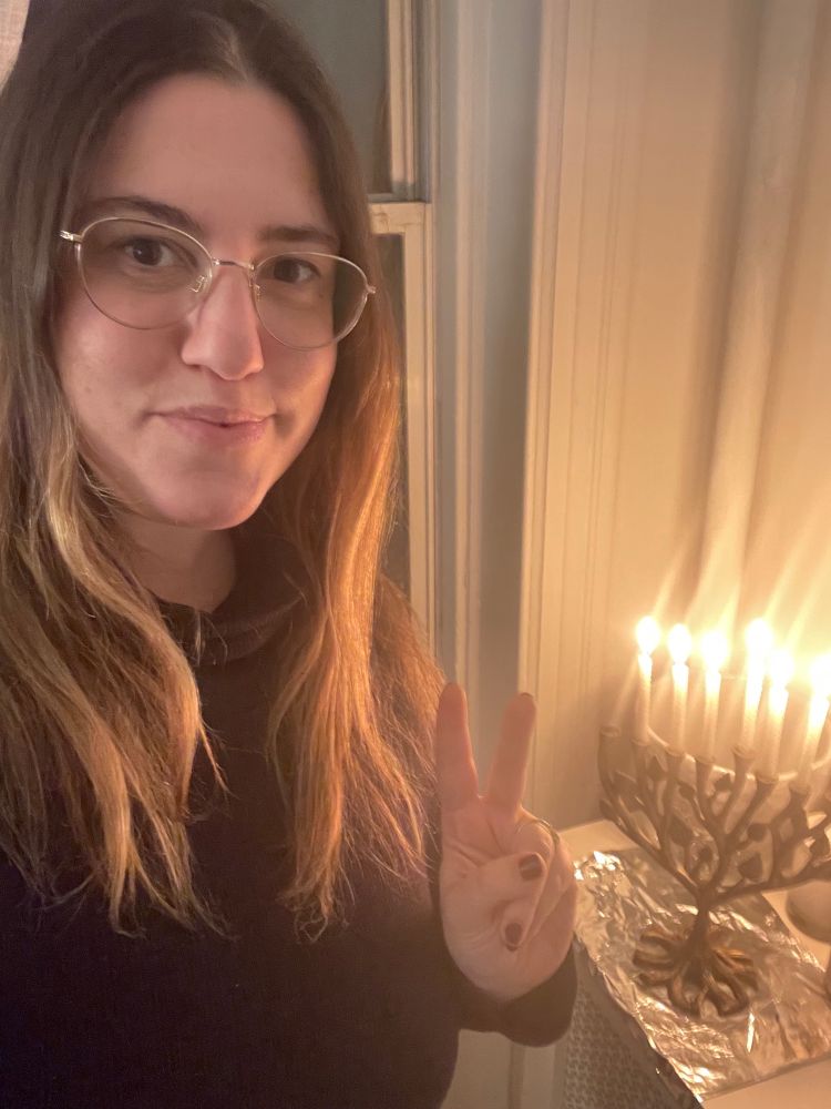 me in front of a menorah