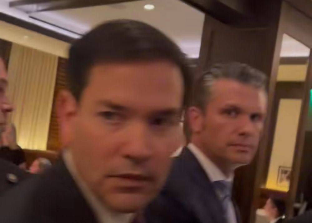 a screen grab of marco rubio and pete hegseth in a follow up video to the original protest video