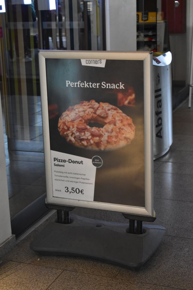 Poster for "Perfekter Snack: Pizza Donut"