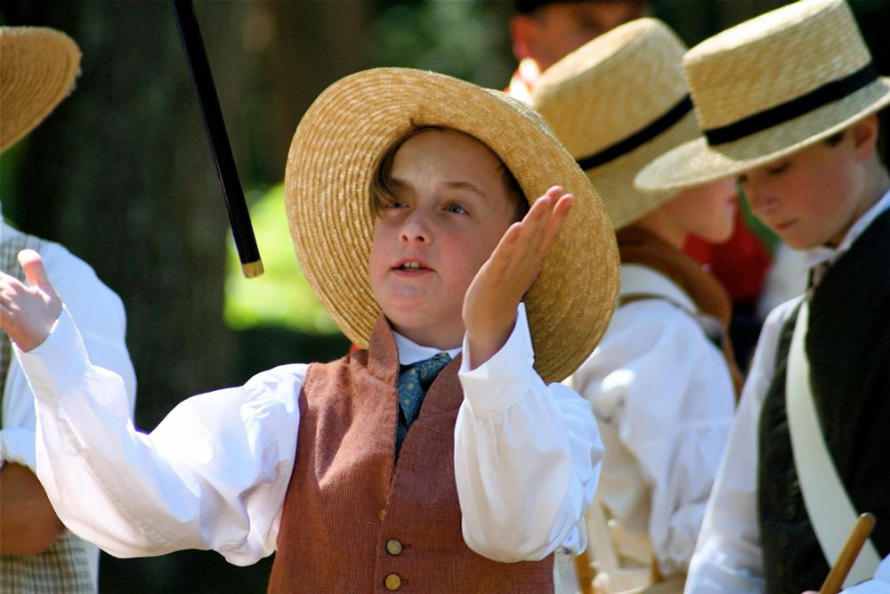 Musician throwing up his fife.
