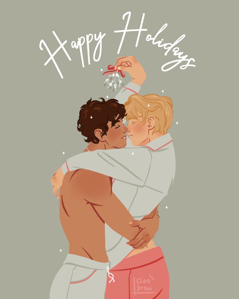Two men, and latinx with curls and a white blond, are embracing, almost kissing. The blond man is holding mistletoe over their heads. 