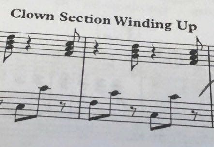 Music in 6/8 with the performance instruction "Clown Section Winding Up"