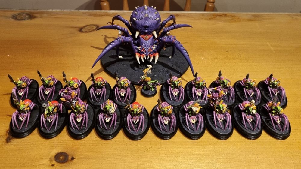 22 spiderfang miniatures from Age of Sigmar gloomspite gitz. Painted in a predominantly purple paint scheme.