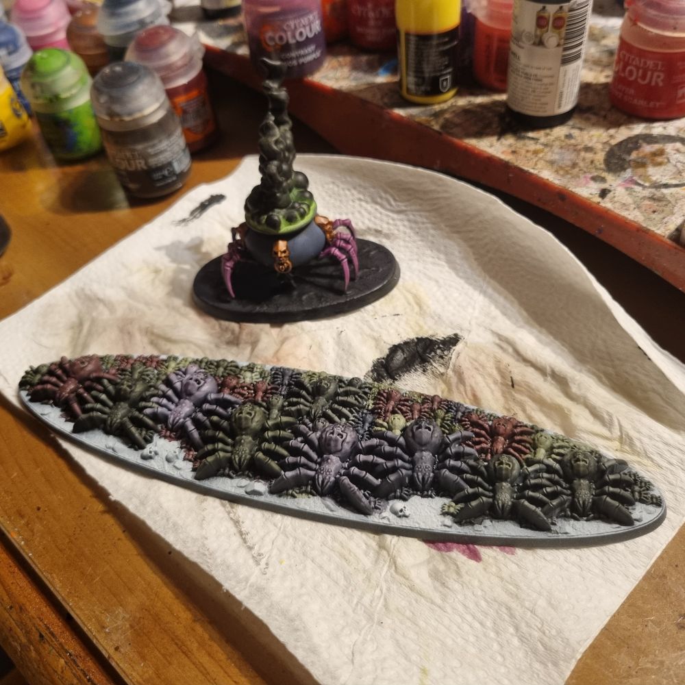 The other two endless spells partially painted.