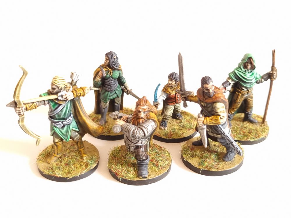 The heroes ready to take on the dangers of Middle earth. Painted in a slap-chop style
