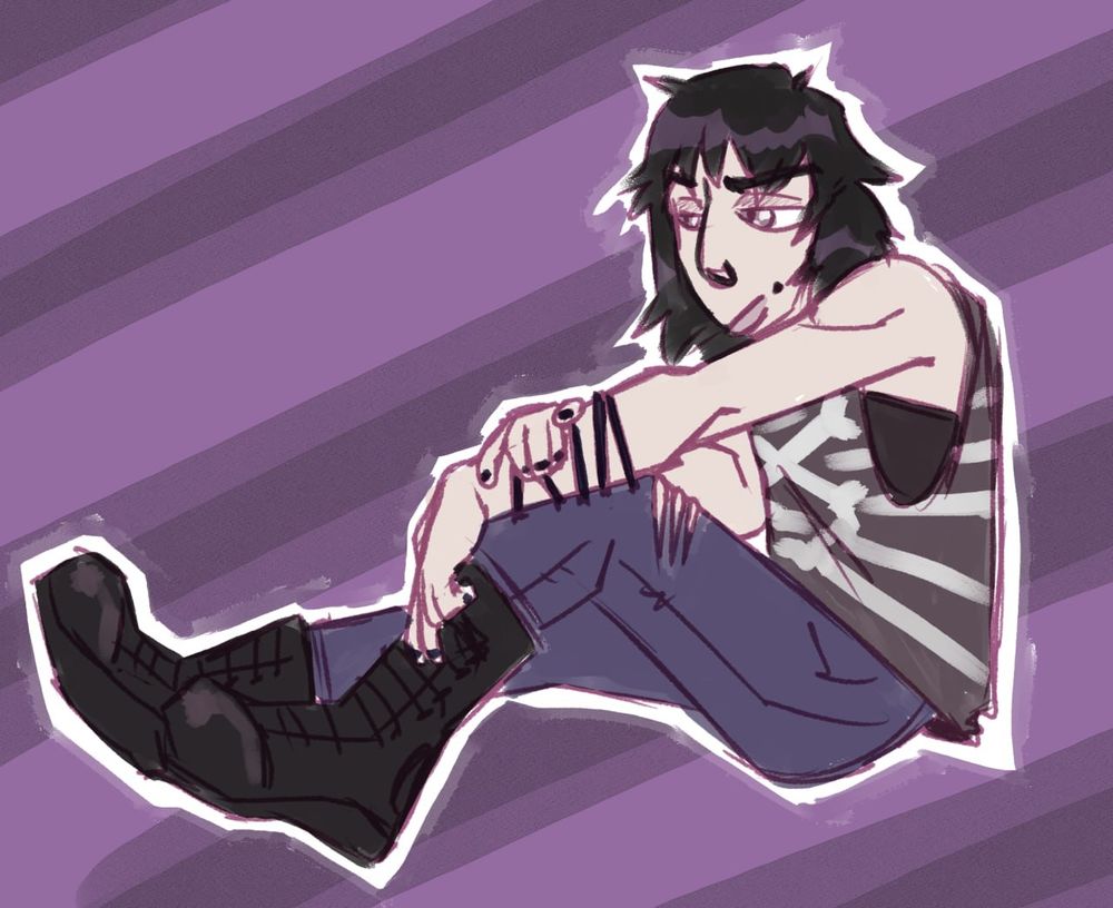 An emo guy (nonbinarily) sitting