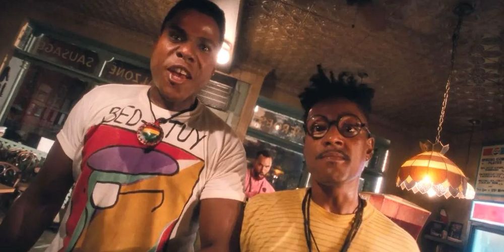 Still from "Do the Right Thing," with Radio Raheem (Bill Nunn) and Buggin' Out (Giancarlo Espocito), staring back inside Sal's Pizzeria.