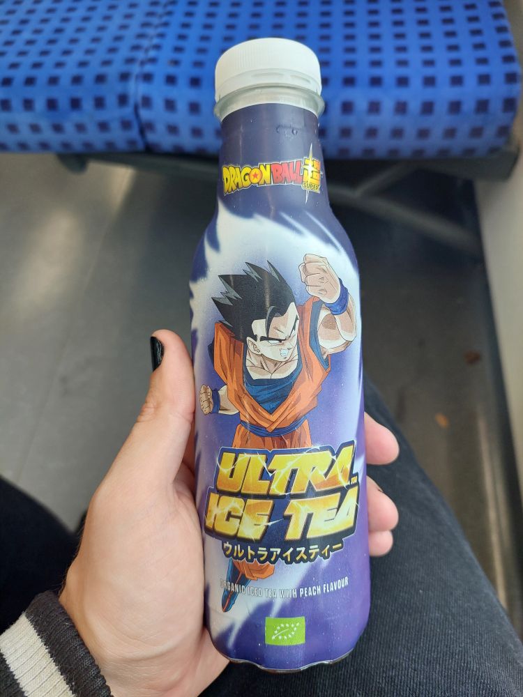 A bottle of dragon ball themed ultra ice tea with a Goku on the bottle 