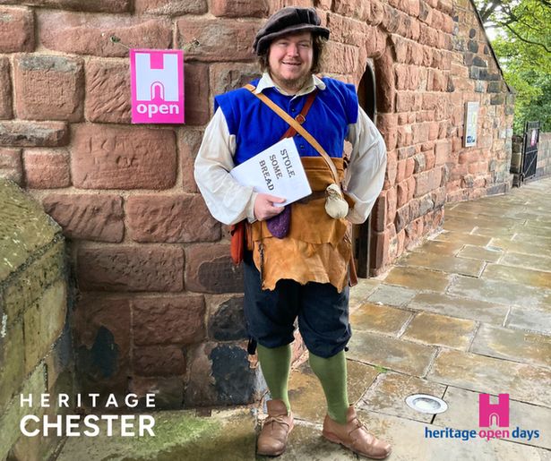 A person in Tudor-era costume portraying Miles Mason, a stone mason, stands outside the historic King Charles Tower along Chester's medieval city walls. The costumed interpreter is dressed in period-appropriate clothing as part of a heritage open day event, helping to bring Chester's Tudor history to life for visitors exploring the ancient fortifications.