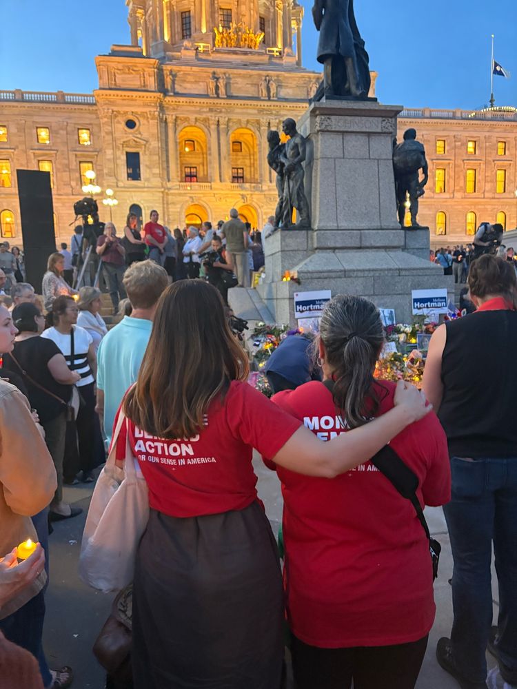Another Moms Demand Action volunteer and me in front of the memorial for MN Speaker Melissa Hortman at the MN State Capitol. 