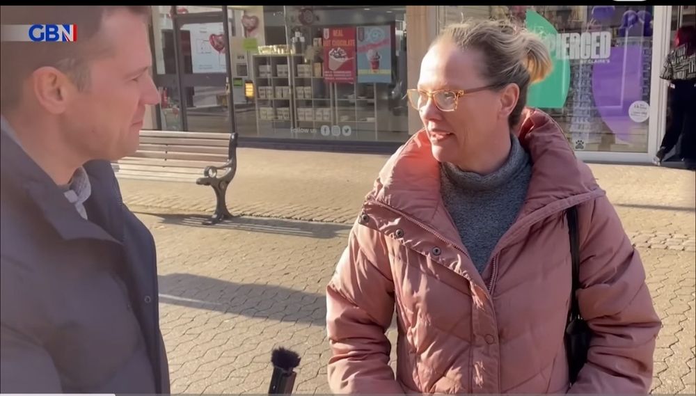 Robert Jenrick interviews a white woman