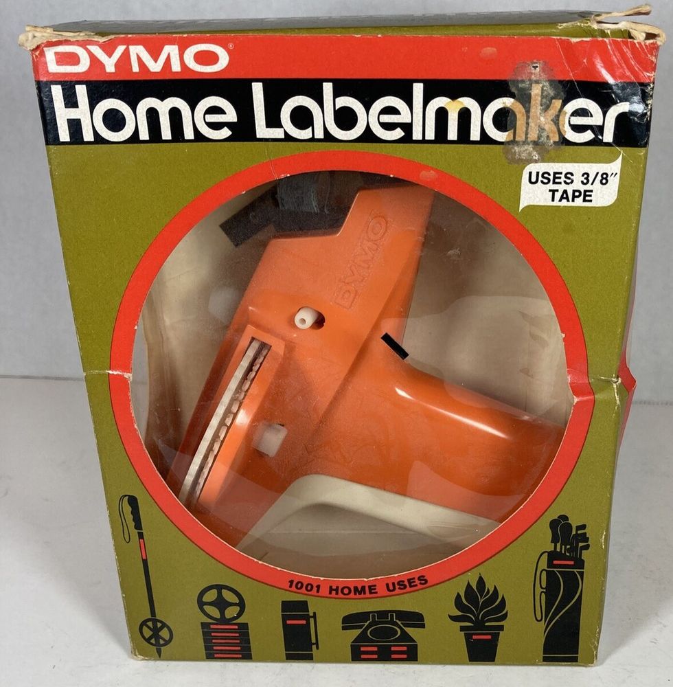 An orange 1970’s Dymo labelmaker. 