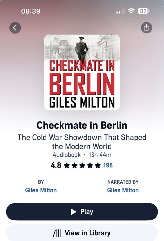 Copy of book cover - showing Russian Commander striding in Berlin streets