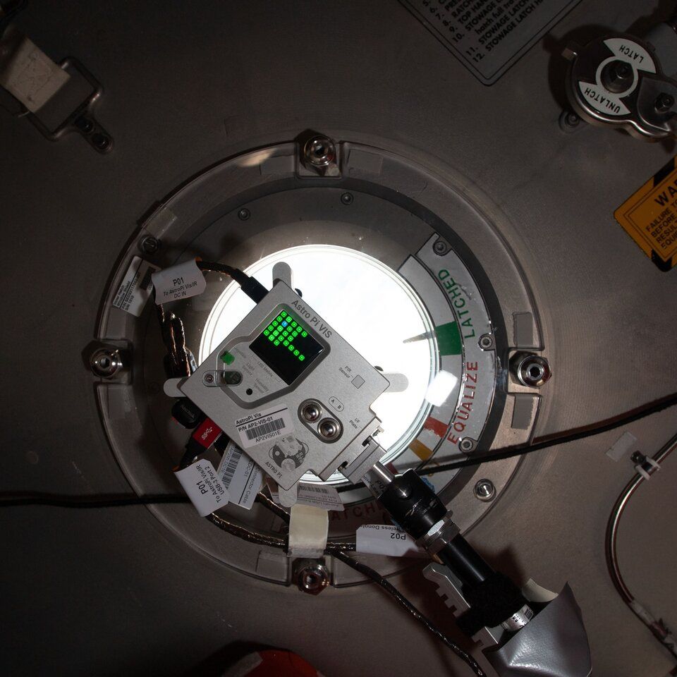 A photo of a special Raspberry Pi computer called "Astro Pi" in the window Columbus module on the ISS for the European Astro Pi Challenge.