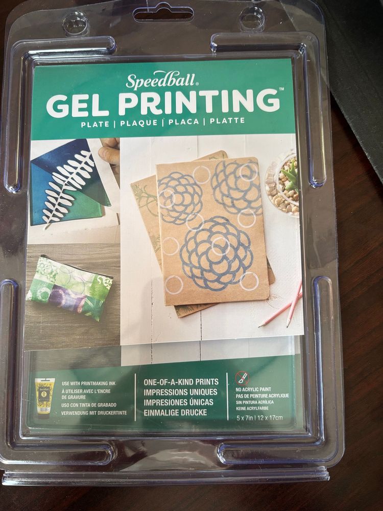 A gel print plate in its packaging. The plate is used to make monoprints but applying various inks and paints, stencils etc. 