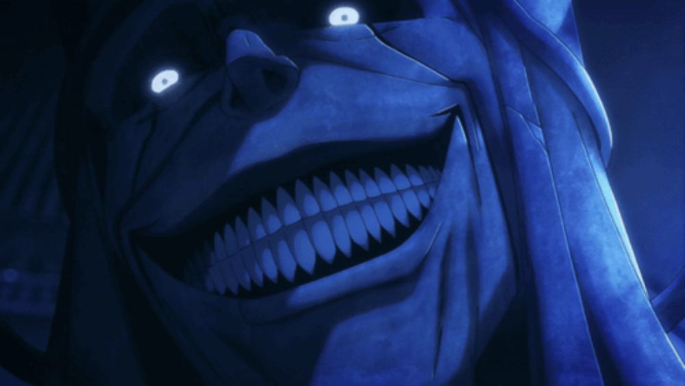 a close up of a cartoon character 's face with glowing eyes and teeth