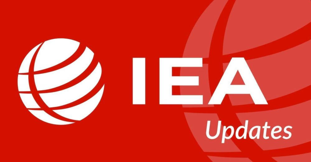 IEA logo on a red background with and the word updates sitting underneath 