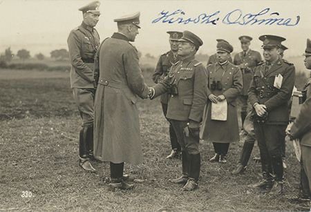 Amb. Ōshima shaking hands with German officers at the front. 