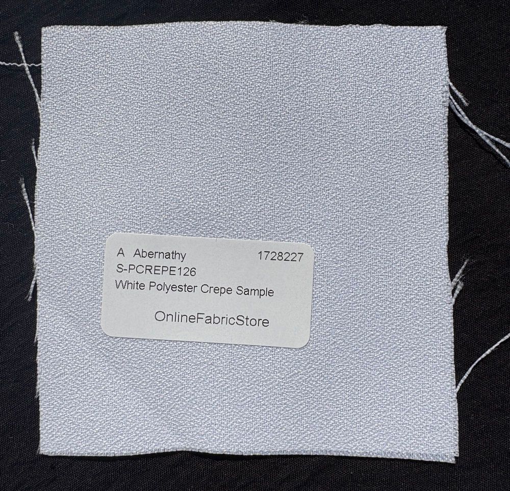 A swatch of 100% polyester crepe in white