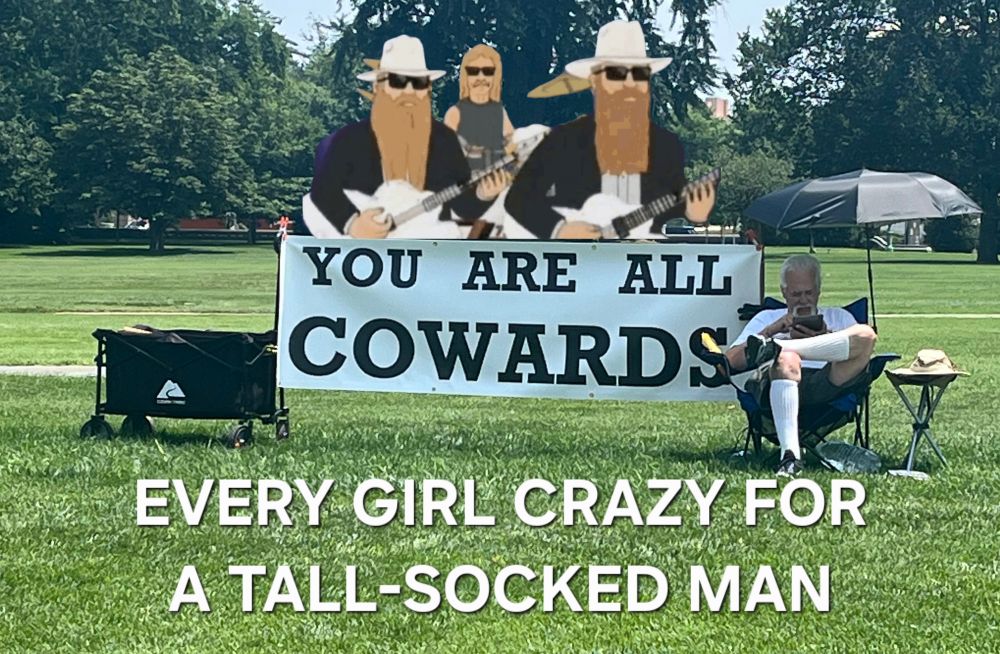 man on lawn in dc with sign plus zz top and every girl crazy for a sharp dressed man
