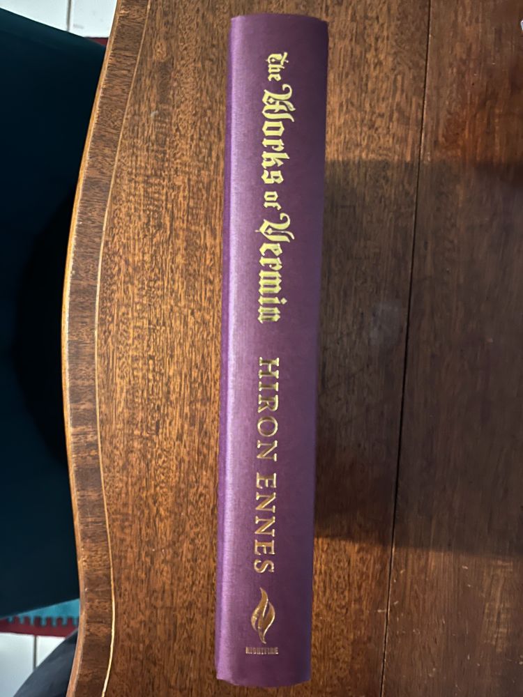 Works of Vermin spine without the dust jacket, bright gold with sick gothic font