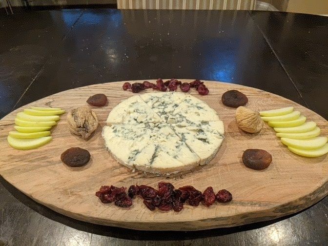 A whole wheel of blue! This one has a checkerboard of figs, dates, dried cranberries, and apple slices 