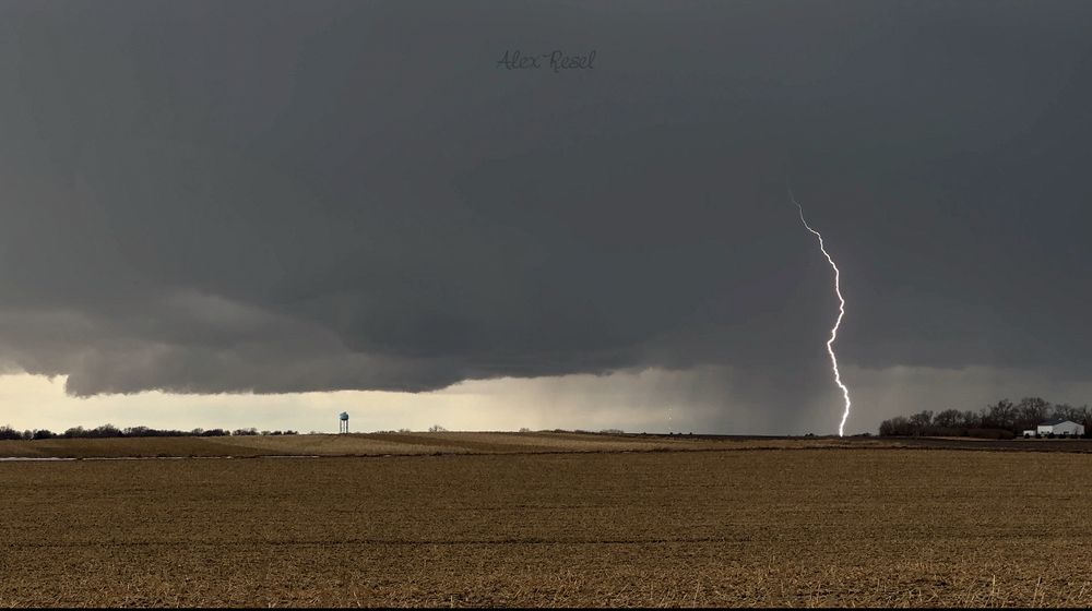 Photo of supercell with evident low level features, organized base, and lightning on the west side of Watertown, South Dakota - 3:30 pm (2/24/2025)