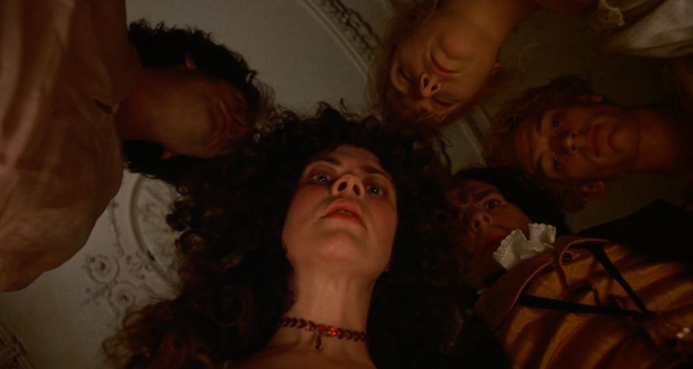 A group of people seen from below from the Ken Russell film GOTHIC