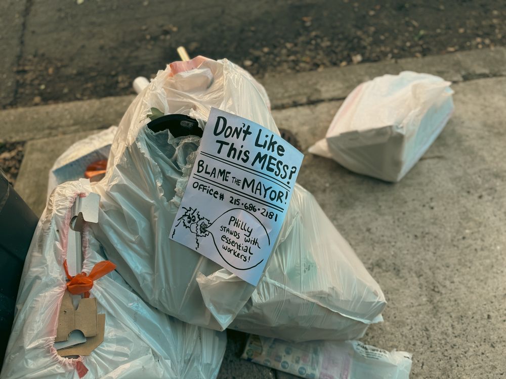 A bag of trash with the mayor of Philadelphia’s office phone# 