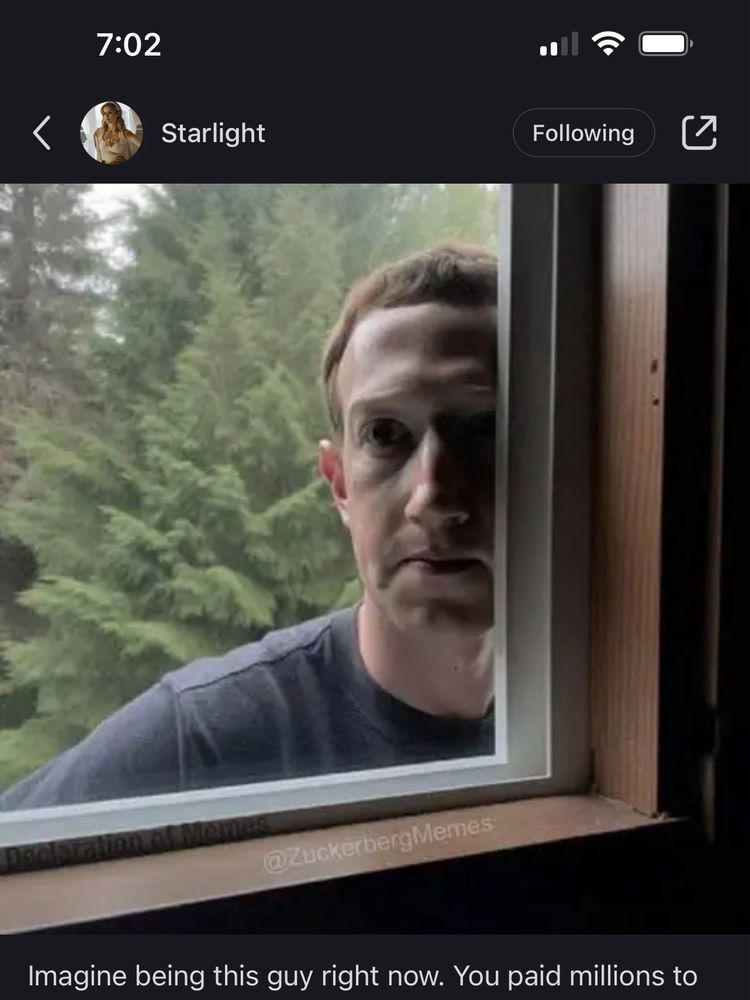 Mark Zuckerberg standing outside a window looking in like a peeping Tom