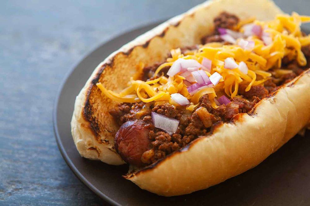 Soup (A hot dog topped with chili, cheese, and diced onions) 