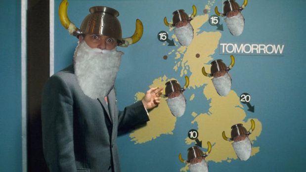 me in front of an old style tv weather map, with cutouts of my head wearing an xmas beard and banana colander hat taking the place of clouds across the UK