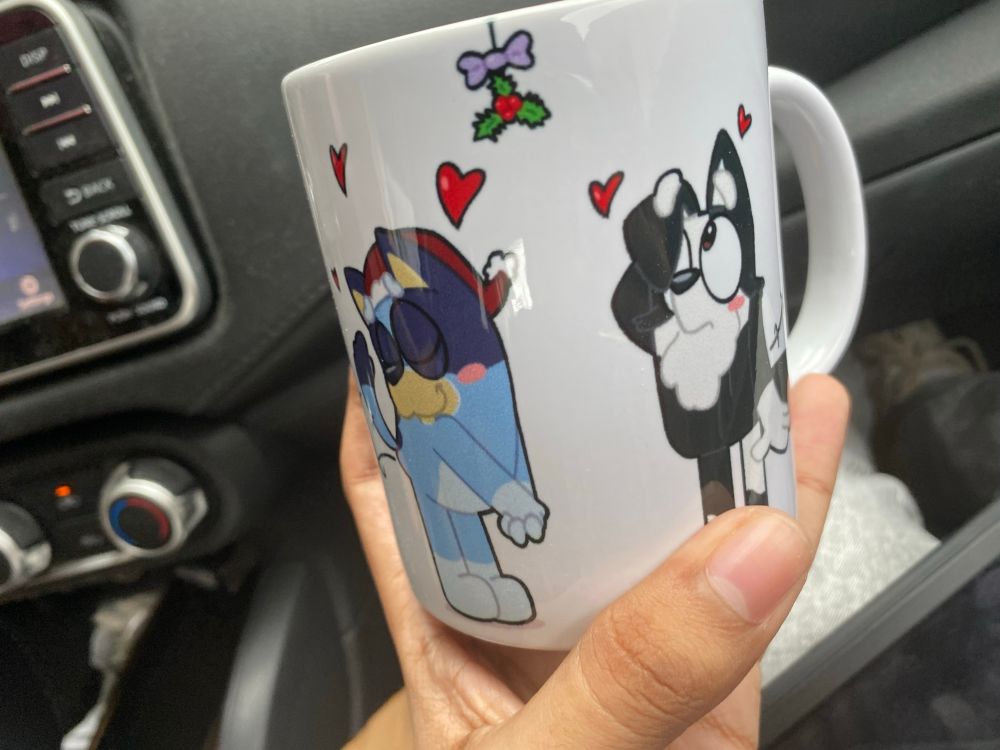 Coffee mug with AussiePups' art on it