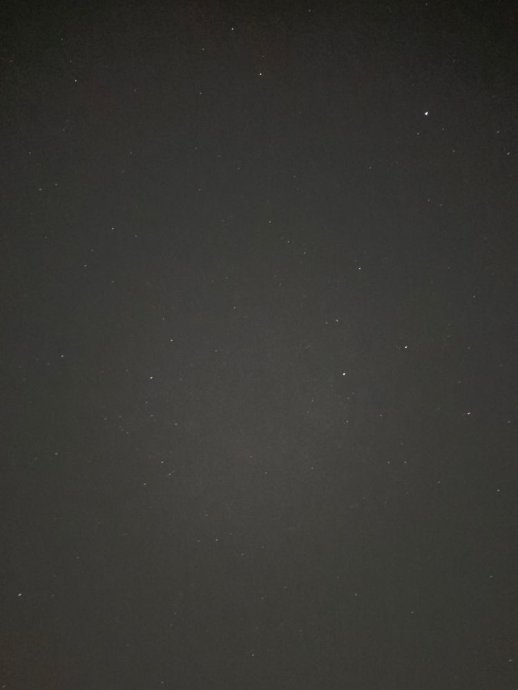 A long exposure of a star field from the “selfie” camera on an iPhone. 