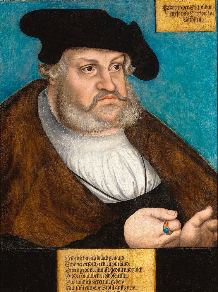 Portrait of Frederick III, Elector of Saxony (c. 1530–1535)
An older man with grey hair, a mutton-choppy beard and mustache, wearing a black hat and brown fur over a white shirt. 