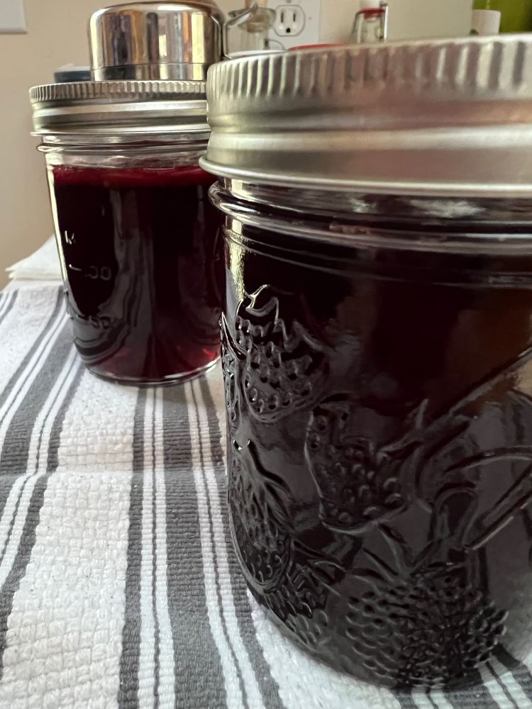 Close up of homemade mixed berry jelly.
